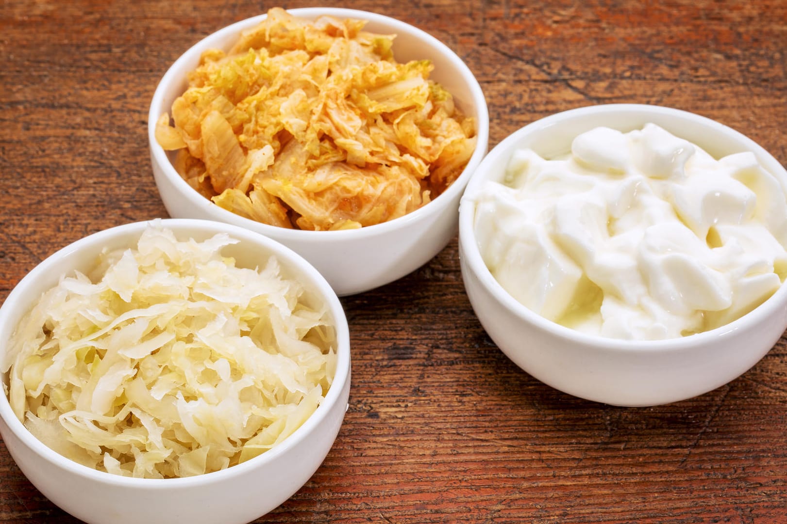 Probiotika: Sauerkraut, Kimchi und Joghurt gehören zu den bekanntesten probiotischen Lebensmitteln.