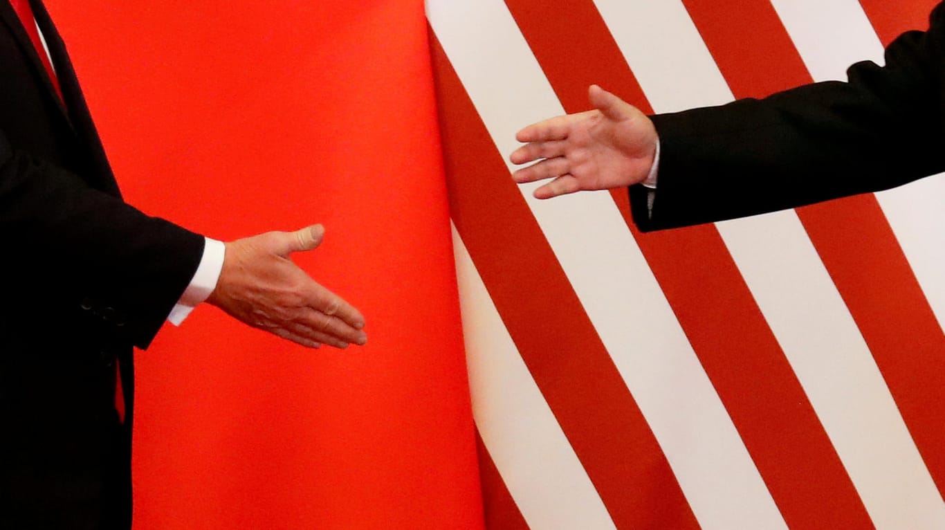 Chinas Präsident Xi Jinping (l.) und US-Präsident Donald Trump (Archiv)