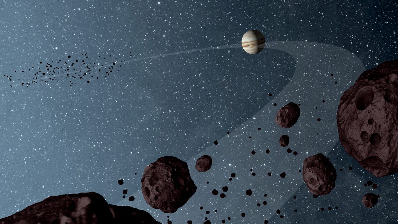 Eine NASA-Illustration zeigt die "Trojan asteroids", die auf der Umlaufbahn des Jupiters in derselben Richtung kreisen: Der Asteroid 2015 BZ509 kreist entgegen der üblichen Flugrichtung. Eine NASA-Illustration zeigt die "Trojan asteroids", die auf der Umlaufbahn des Jupiters in derselben Richtung kreisen: Der Asteroid 2015 BZ509 kreist entgegen der üblichen Flugrichtung.