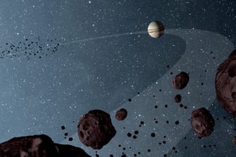 Eine NASA-Illustration zeigt die "Trojan asteroids", die auf der Umlaufbahn des Jupiters in derselben Richtung kreisen: Der Asteroid 2015 BZ509 kreist entgegen der üblichen Flugrichtung.