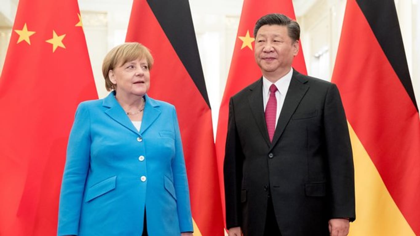 Angela Merkel neben dem chinesischen Präsidenten Xi Jinping.