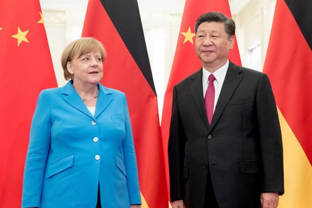 Angela Merkel neben dem chinesischen Präsidenten Xi Jinping.