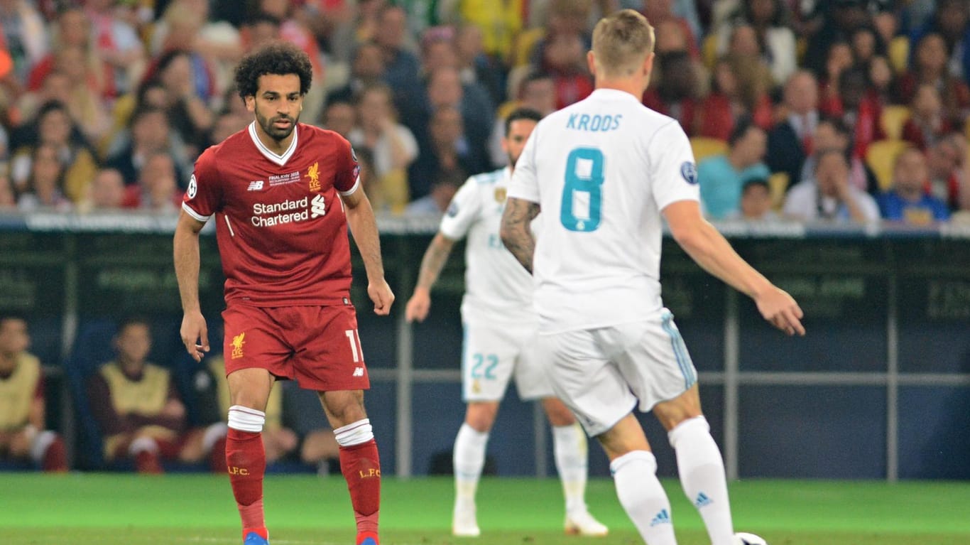 Szene aus dem Champions-League-Finale 2018: Mohamed Salah (rot) und Toni Kroos (r.).