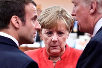 Macron, Merkel und Trump: Zwischen Europa und den USA droht ein Handelskrieg. Noch ist der Ausgang ungewiss.