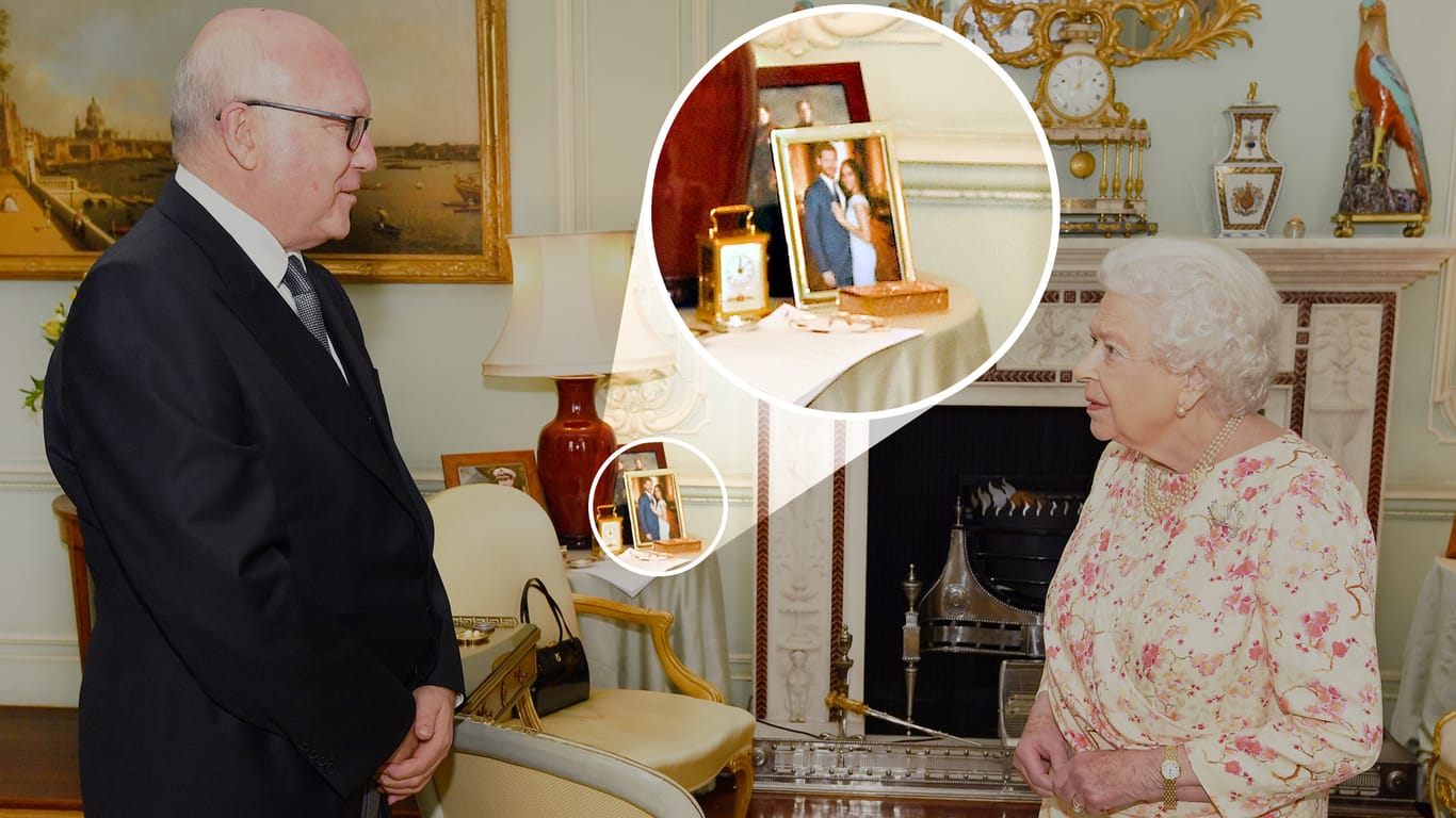 Erwischt: Das Treffen zwischen George Brandis und der Queen rückt in den Hintergrund – das geheime Foto von Harry und Meghan dagegen wird zum Fokus.