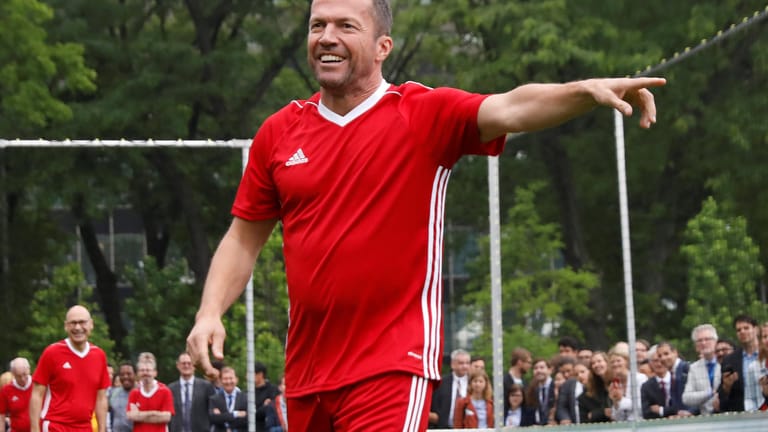 Former soccer player Lothar Matthaeus celebrates a goal on a pitch on the North Lawn during a German-sponsored event at the United Nations headquarters promoting positive impact of the sport ahead of the World Cup in Manhattan