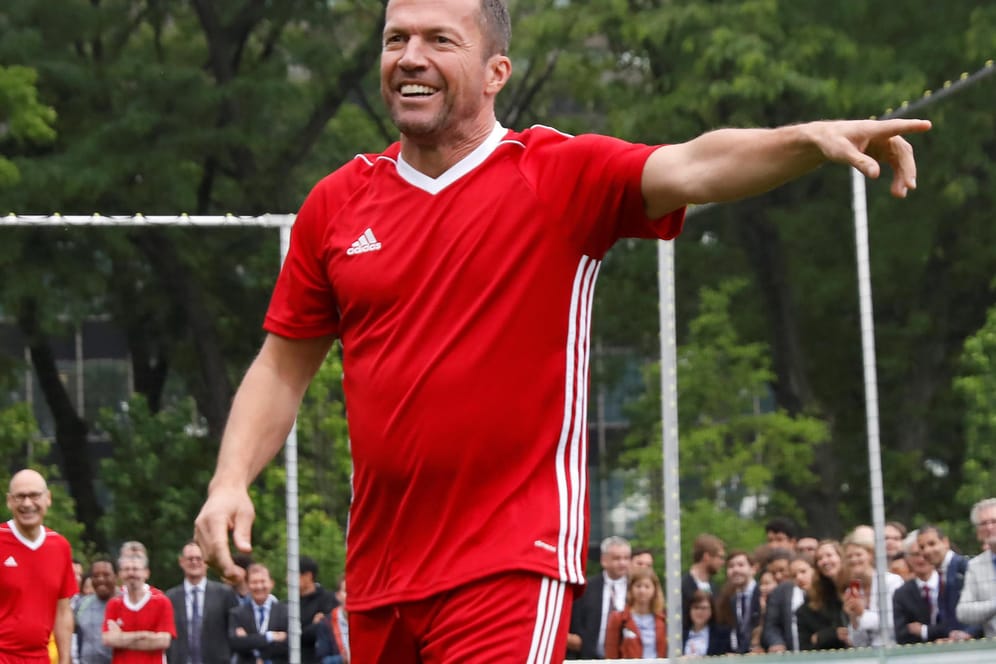 Former soccer player Lothar Matthaeus celebrates a goal on a pitch on the North Lawn during a German-sponsored event at the United Nations headquarters promoting positive impact of the sport ahead of the World Cup in Manhattan