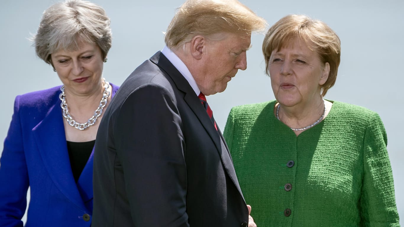 May, Trump und Merkel: Der US-Präsident hat es beim Gipfel nicht leicht.