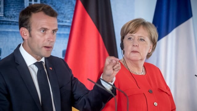 Bundeskanzlerin Angela Merkel und Emmanuel Macron, Präsident von Frankreich, bei einer Pressekonferenz auf Schloss Meseberg. Bundeskanzlerin Angela Merkel und Emmanuel Macron, Präsident von Frankreich, bei einer Pressekonferenz auf Schloss Meseberg.