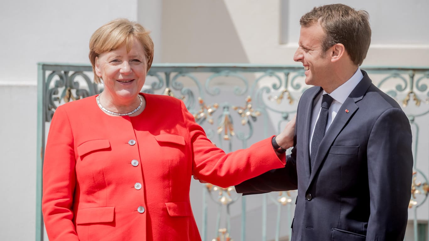 Angela Merkel und Emmanuel Macron auf der Pressekonferenz in Meseberg: Die deutsche Kanzlerin und der französische Präsident haben ein Eurozonen-Budget vorgeschlagen.