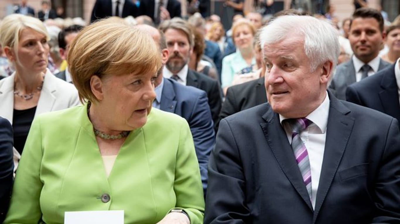 Liegen beim Thema Asylpolitik über Kreuz: Kanzlerin Merkel und Innenminister Seehofer.
