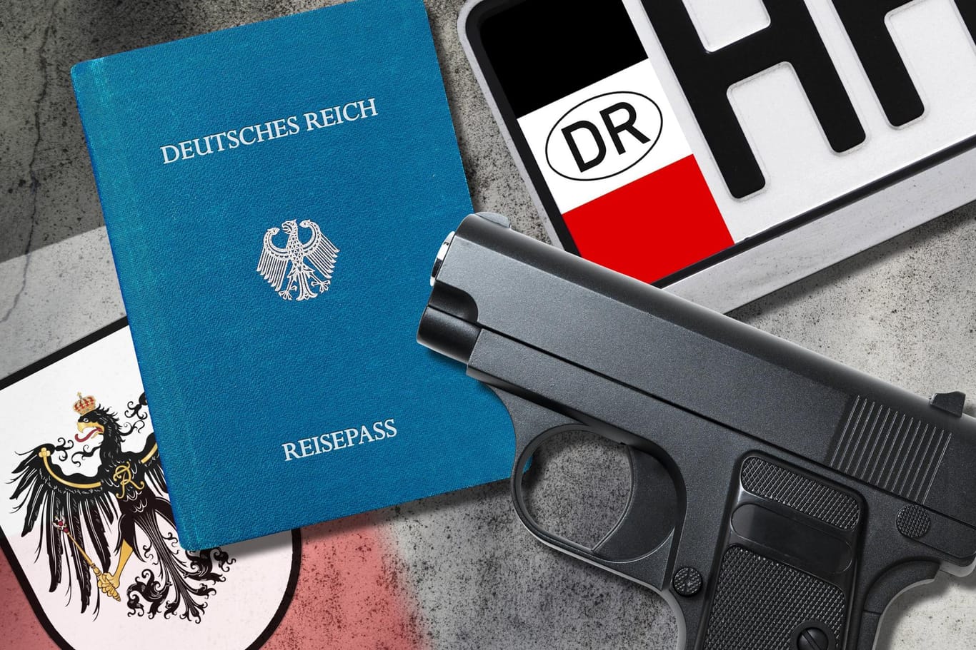 Reichsbürger-Pass und Waffe (Symbolbild): Ein Reichsbürger hat bei seiner Festnahme einen Beamten verletzt.