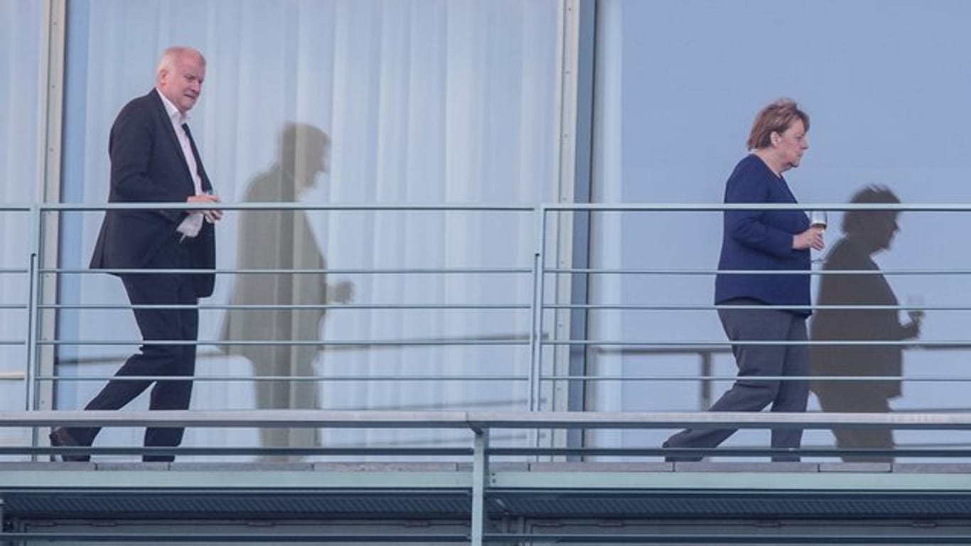 Horst Seehofer und Angela Merkel auf dem Balkon des Bundeskanzleramts.