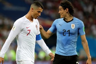 Unterschiedliche Gefühlswelten: Portugals Cristiano Ronaldo (li.) und Uruguays Edinson Cavani.