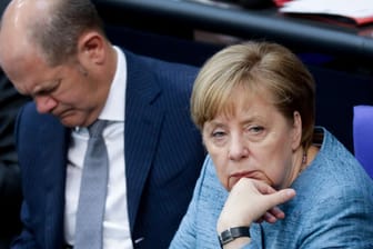 Vize-Kanzler Olaf Scholz (SPD) und Kanzlerin Angela Merkel (CDU): Die Mehrheit der Bundesbürger glaubt, ihre Koalition werde nicht halten.