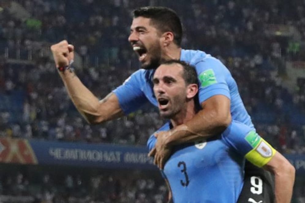 Die Uruguayer Luis Suarez (oben) und Diego Godín fordern die Franzosen heraus.