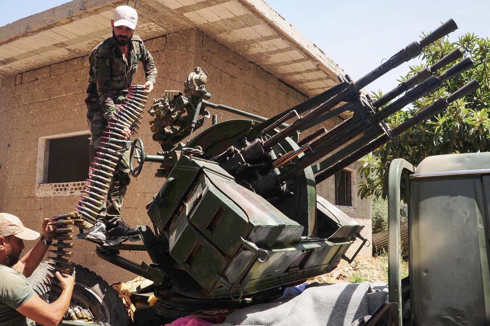 Syrische Soldaten in Daraa: Im Süden Syriens haben die Rebellen aufgegeben.