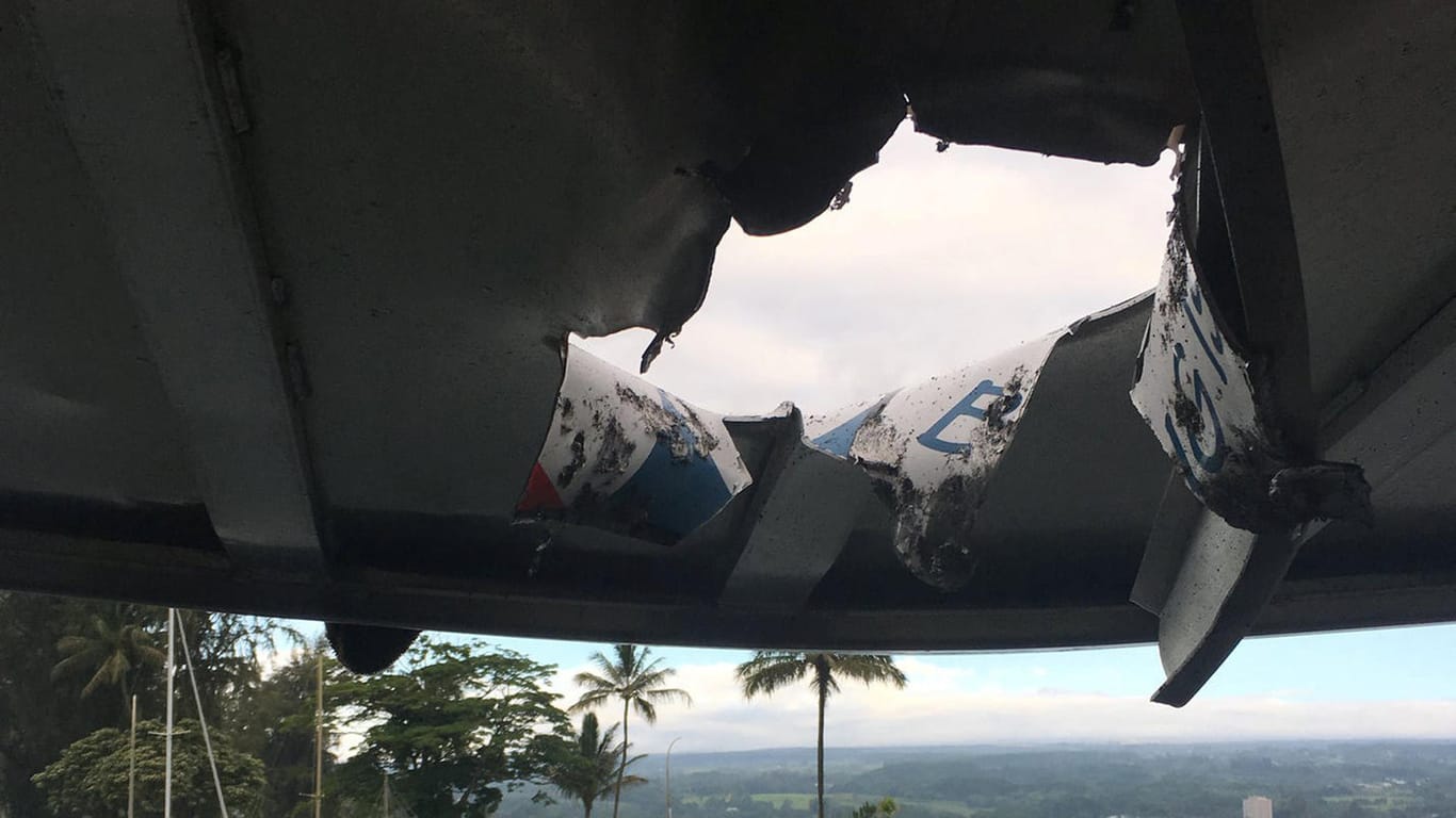Hole punched through the roof of a tourist boat is seen after lava from the Mount Kilauea volcano exploded in the sea off Kapoho