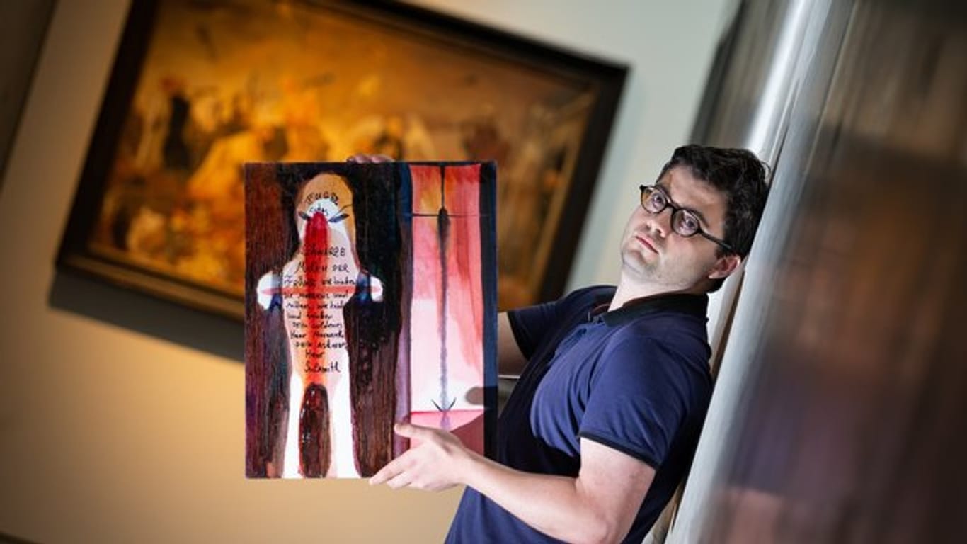 Der russische Künstler Yury Kharchenko mit seinem Bild "Todesfuge" (Öl auf Leinwand, 2012) im Felix-Nussbaum-Haus.