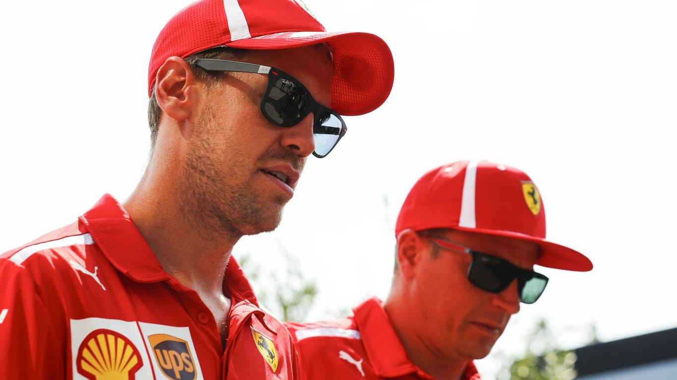 Ferrari-Piloten unter sich: Sebastian Vettel (l.) und Kimi Raikönnen vor dem Rennen in Monza.