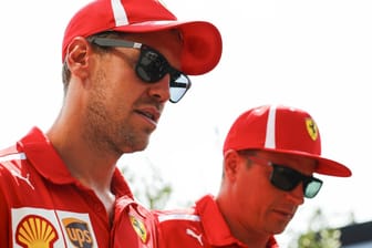 Ferrari-Piloten unter sich: Sebastian Vettel (l.) und Kimi Raikönnen vor dem Rennen in Monza.