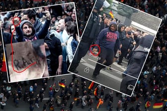 Ein Demonstrationsteilnehmer in Chemnitz: Auf seiner Hand ist ein RAF-Tattoo zu erkennen.