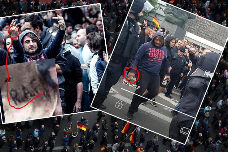 Ein Demonstrationsteilnehmer in Chemnitz: Auf seiner Hand ist ein RAF-Tattoo zu erkennen.