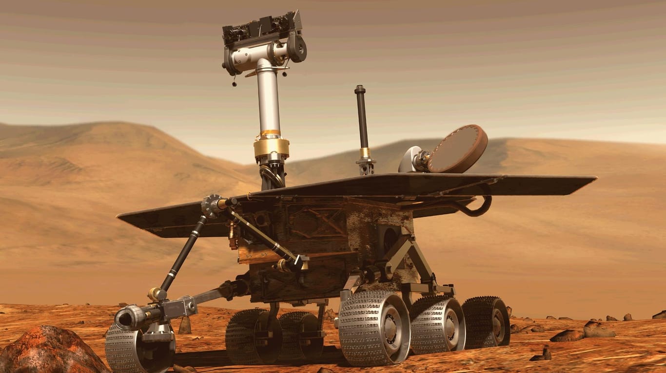 Das NASA-Handout zeigt eine Abbildung des Mars-Rovers "Opportunity" (Archivbild): Im Juni ist der Rover in einen Staubsturm geraten – seitdem bestand Funkstille zwischen ihm und den Forschern der Nasa. Jetzt scheint sich der Himmel über dem Mars aufzuklären.