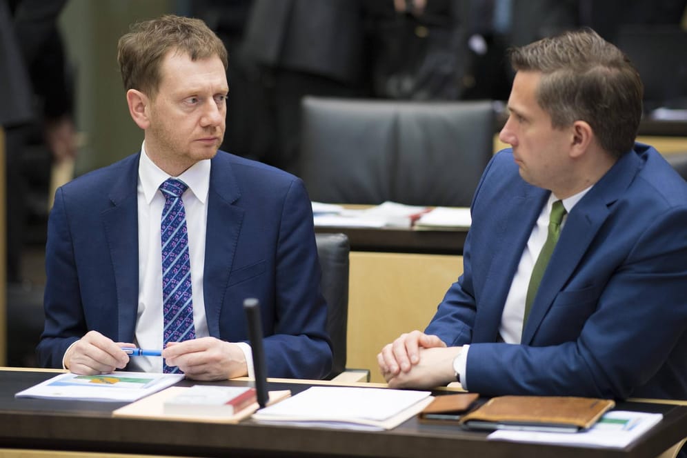Sachsens Ministerpräsident Michael Kretschmer (CDU) und sein Vize Martin Dulig (SPD) vor einer Sitzung im Bundesrat: Für Dulig waren die Szenen in Chemnitz beklemmend.