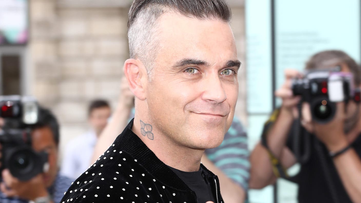 Robbie Williams: Seine jüngste Tochter scheint ein ziemlich entspanntes Baby zu sein.