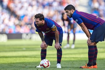 Lionel Messi und Luis Suarez (r.): Die Barcelona-Stars haben jetzt tzwei Punkte Vorsprung auf Erzrivale Real Madrid.