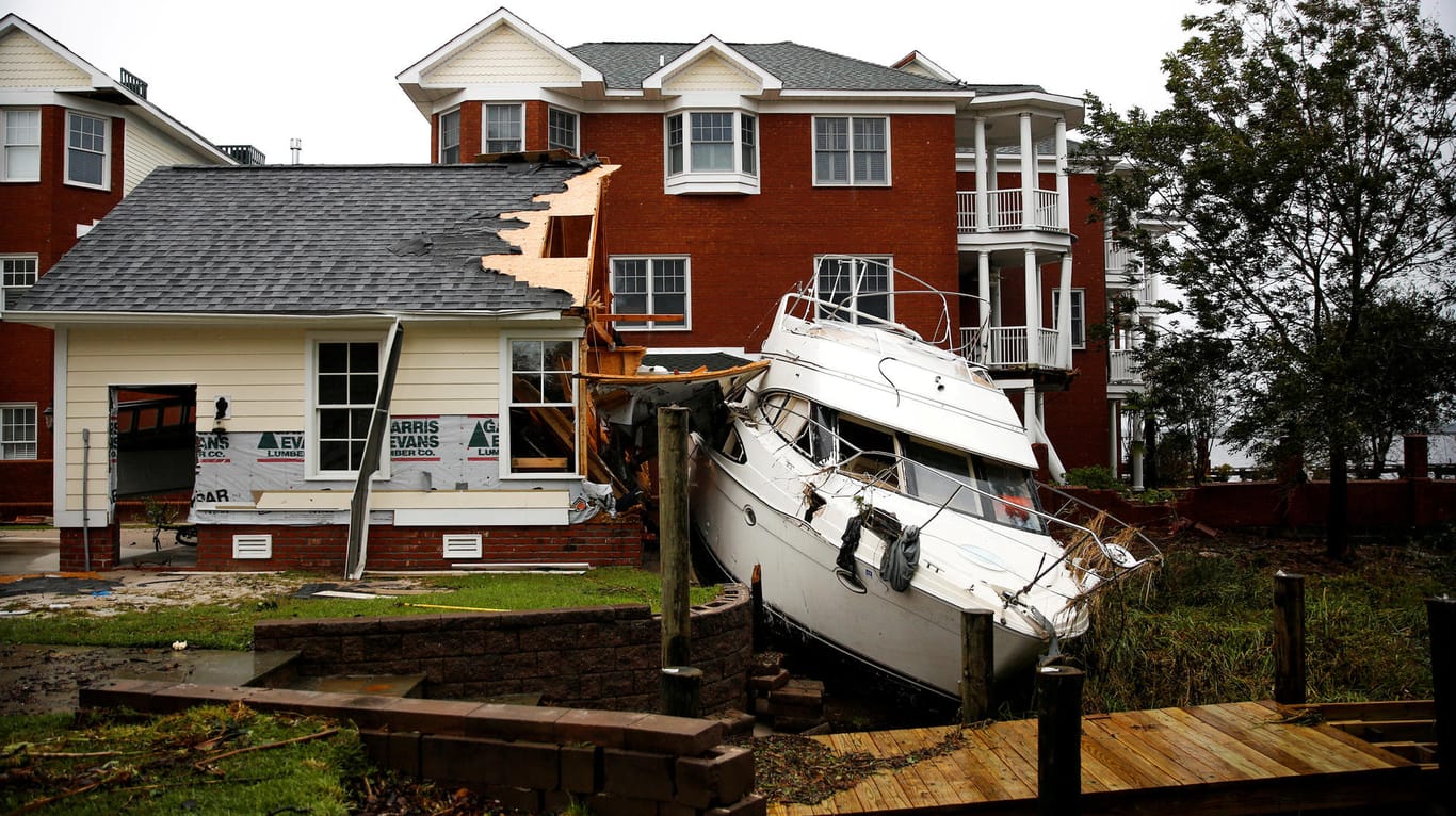 Boot und Haus haben in New Bern, North Carolina, durch "Florence" gelitten.
