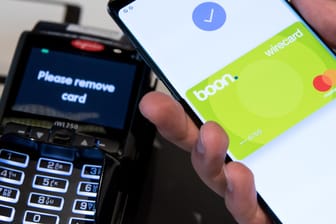 Die Bezahl-App "boon" von Wirecard auf einem Smartphone: Das künftige DAX-Mitglied Wirecard kümmert sich um die Abwicklung digitaler Zahlungen.