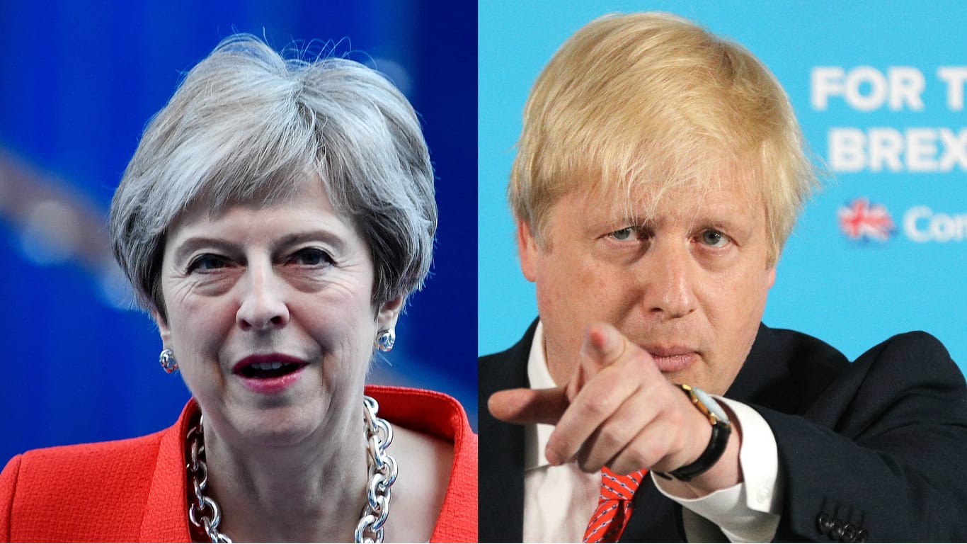 Premierministerin May und ihr Ex-Minister Johnson: Heftiger Schlagabtausch beim Parteitag der Tories.