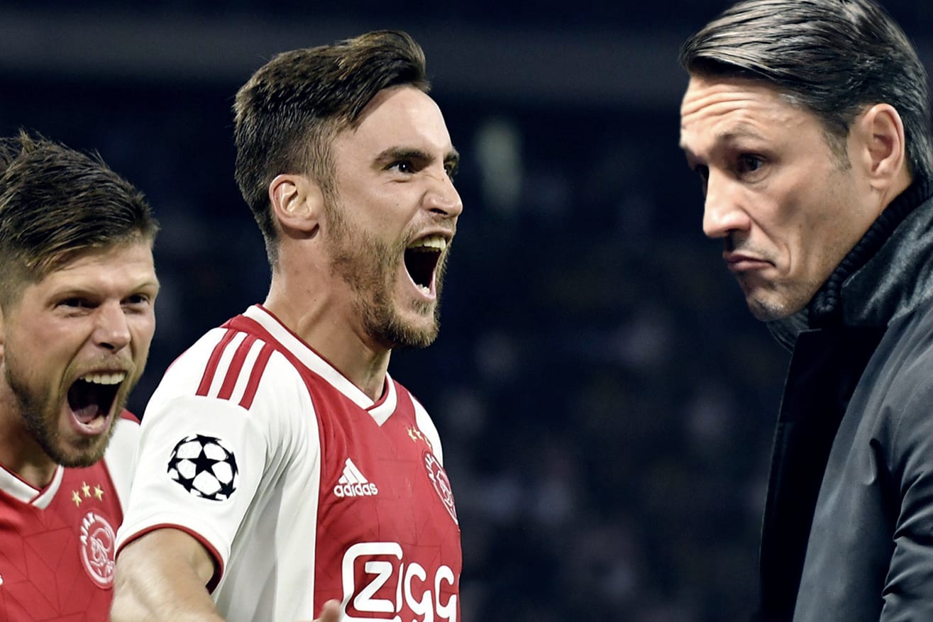 Kein leichter Gegner: Ajax Amsterdam (l.) will dem FC Bayern ein Bein stellen.