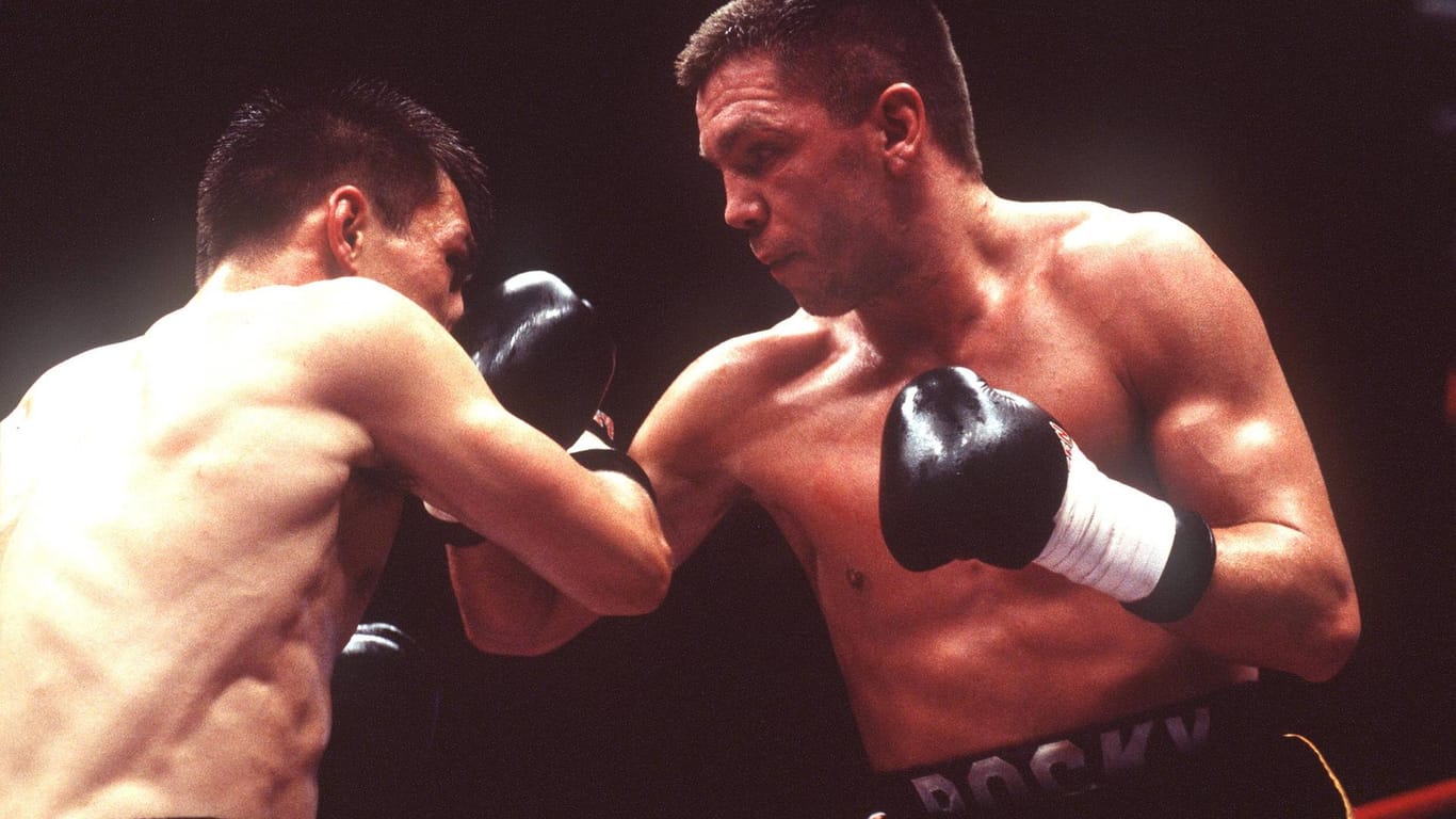 Dariusz Michalczewski (l.) gegen Graciano Rocchigiani: "Rocky" verlor beide Duelle knapp und umstritten.