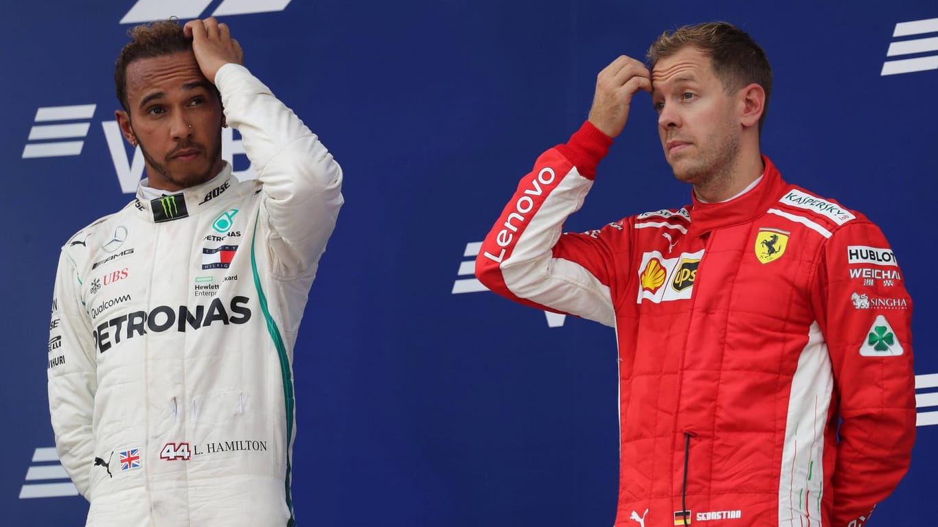 Ist ihm der Titel noch zu nehmen? Sebastian Vettel (r.) will den vorzeitigen WM-Titel von und Lewis Hamilton in Austin verhindern.