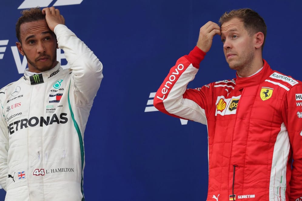 Ist ihm der Titel noch zu nehmen? Sebastian Vettel (r.) will den vorzeitigen WM-Titel von und Lewis Hamilton in Austin verhindern.