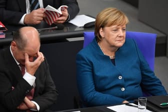 Im Umfragetief: Vizekanzler Olaf Scholz und Kanzlerin Merkel.