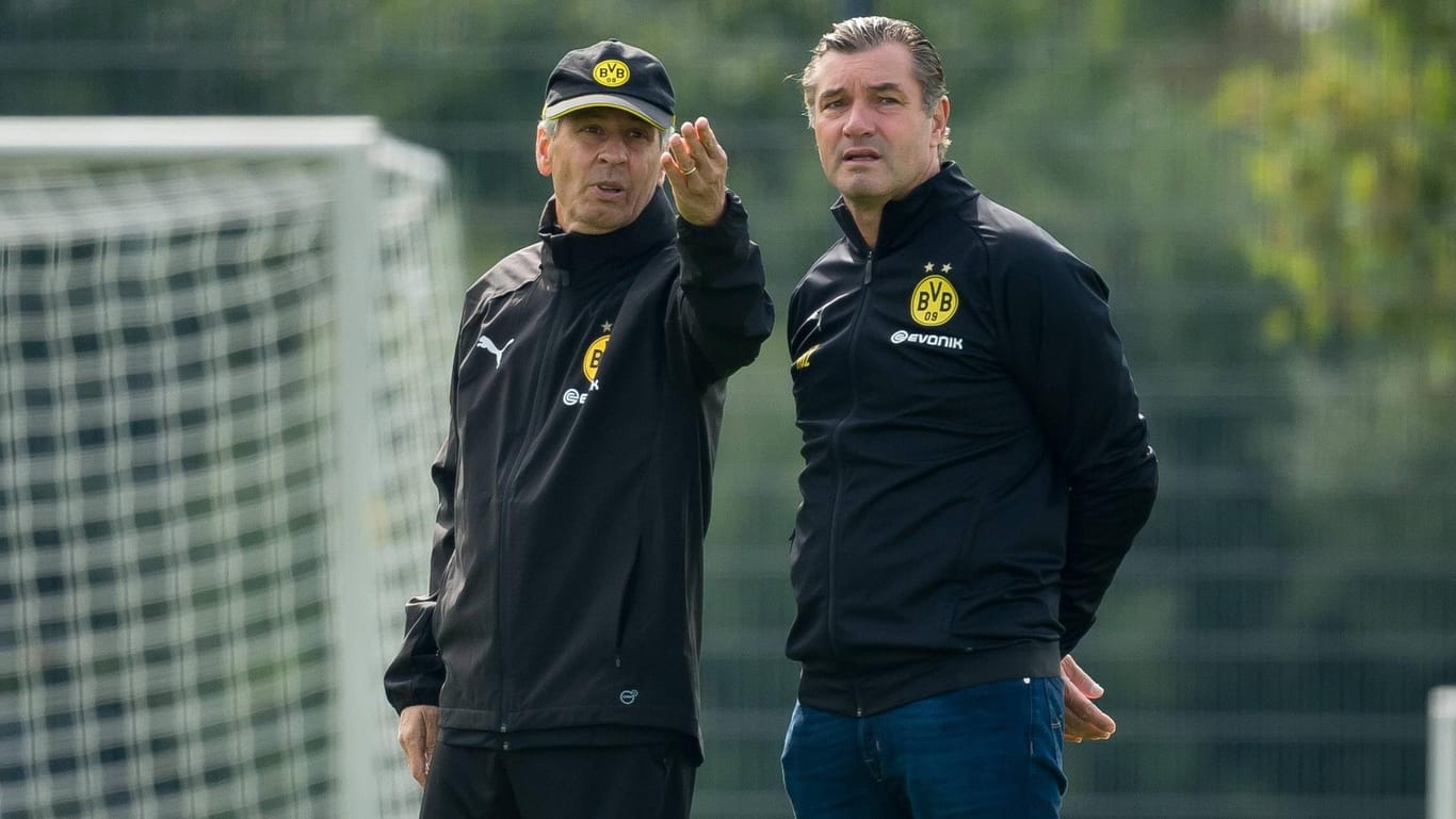 Den nächsten Neuzugang im Blick? Dortmunds Trainer Favre (li.) und Sportdirektor Michael Zorc.