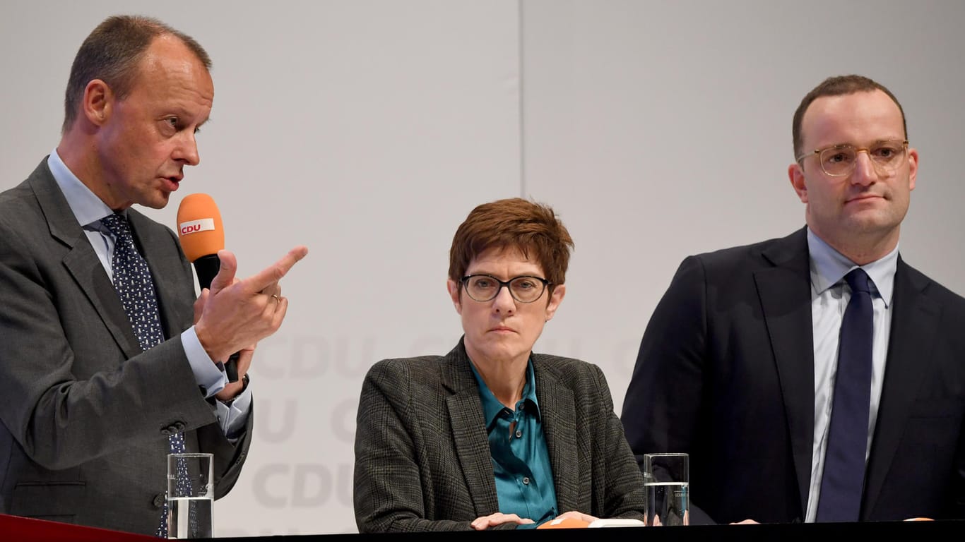 Friedrich Merz, Annegret Kramp-Karrenbauer, Jens Spahn auf der CDU-Regionalkonferenz in Lübeck.