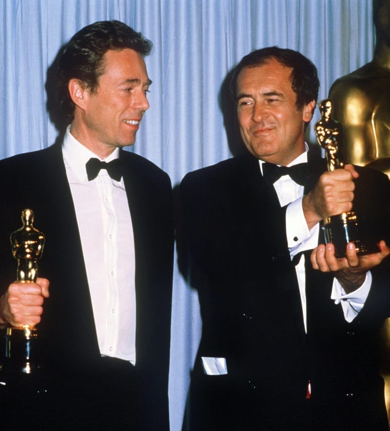 Bernardo Bertolucci (r.) wurde 1988 mit dem Oscar ausgezeichnet.