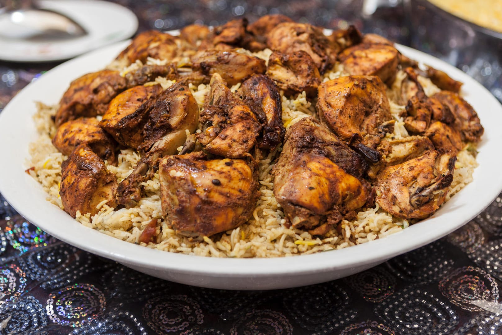 Mackboos mit Hühnchen: Dieses Gericht hat in den Emiraten Tradition. (Symbolfoto)