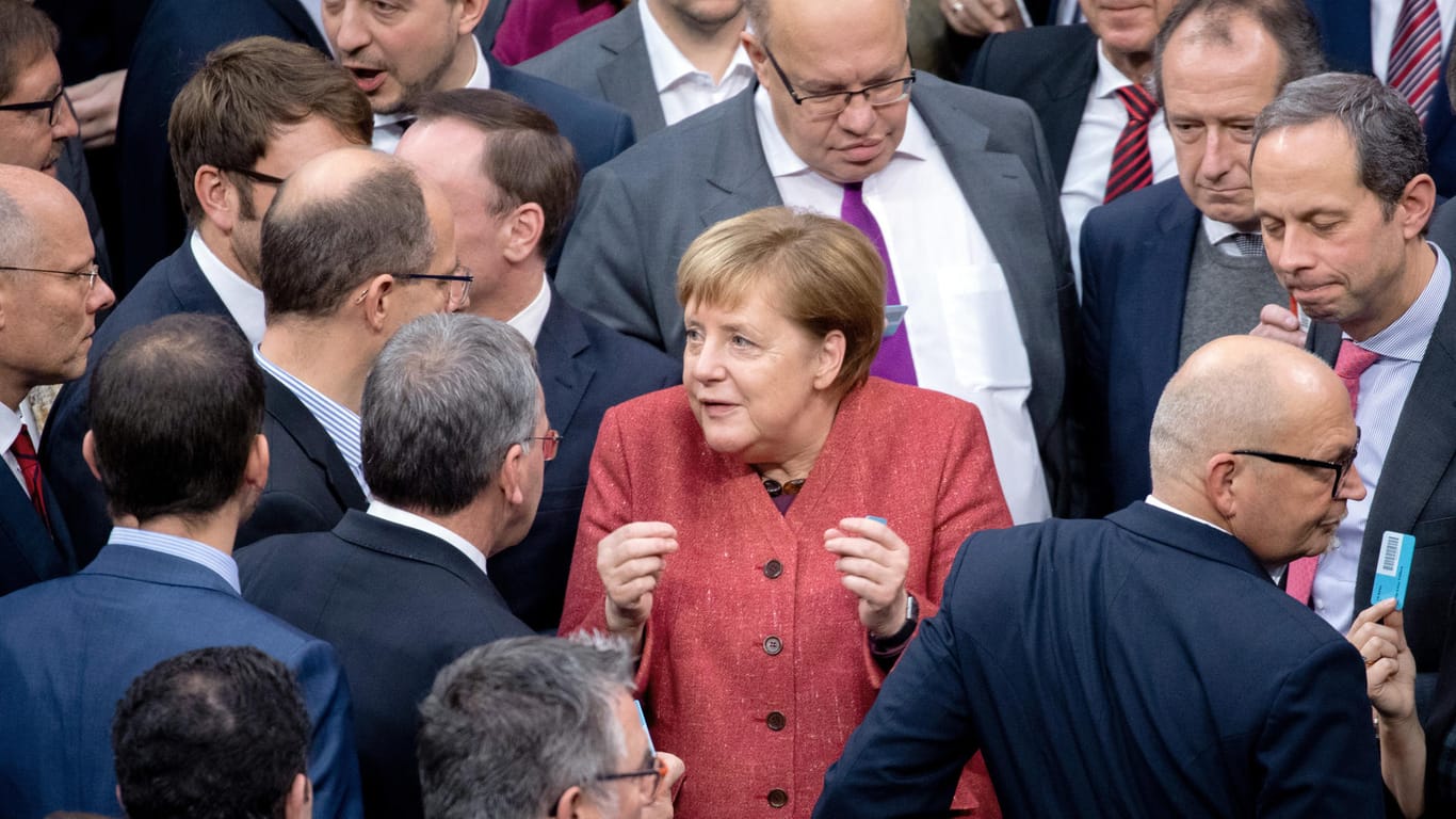 Bundeskanzlerin Angela Merkel (CDU) im Bundestag: Das deutsche Parlament hat dem UN-Migrationspakt zugestimmt.