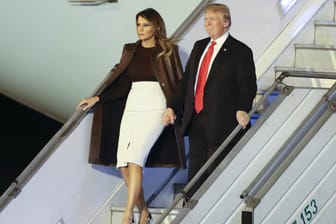 Donald und Melania Trump bei der Ankunft in Buenos Aires: In Gedanken zu Hause