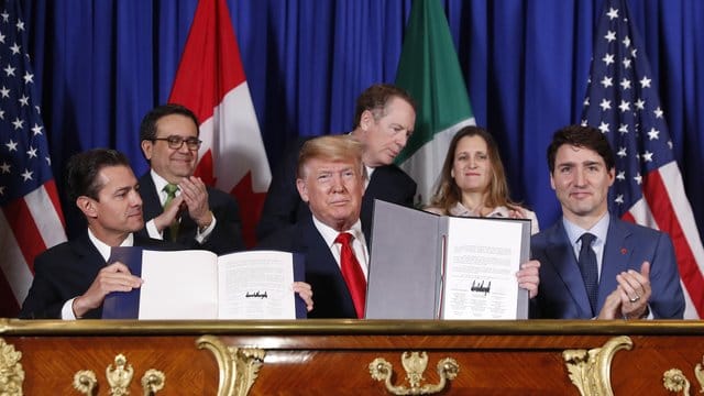 US-Präsident Donald Trump, Kanadas Premierminister Justin Trudeau und der mexikanische Präsident Enrique Pena Nieto (l.