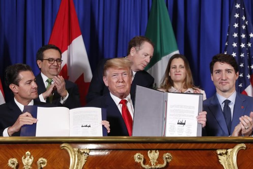 US-Präsident Donald Trump, Kanadas Premierminister Justin Trudeau und der mexikanische Präsident Enrique Pena Nieto (l.