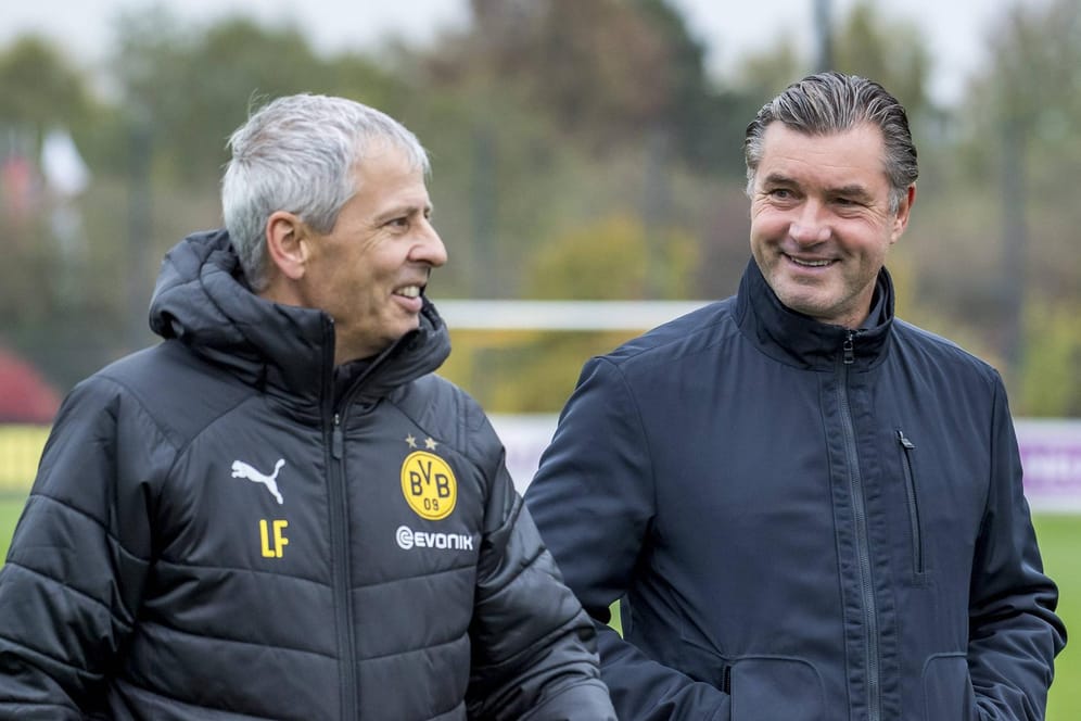 Dortmunder Erfolgsduo:Sportdirektor Michael Zorc (r.) ist begeistert von der Arbeit von Trainer Lucien Favre.