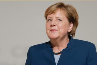 Angela Merkel beim CDU-Parteitag in Hamburg: Für den Grünen-Politiker Jürgen Trittin ist der Wahlsieg Annegret Kramp-Karrenbauers auch ein Triumph der Kanzlerin.