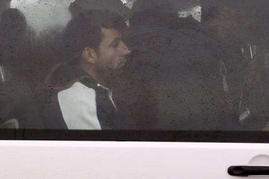 Flüchtlinge in einem kroatischen Polizeibus.
